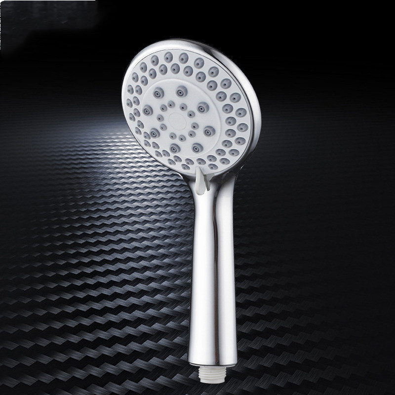 ABS New Material Pressurized Hand-Held Shower Nozzle Shower Bathroom Universal Shower Head Shower Sanitary Ware Factory Wholesale