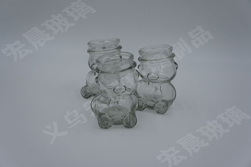 Manufacturers direct sales delicate lovely multi-model bearing-type pressure cap glass candy bottle glass decoration