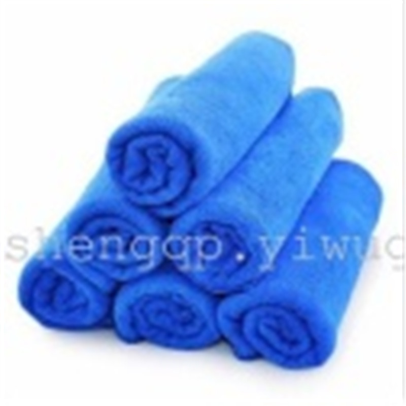The towel with super absorbent microfiber towel washing and waxing the car