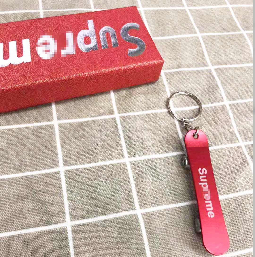 Manufacturer supplies environmental protection aluminum alloy slide plate opener metal bottle opener aluminum key chain pendant creative driver