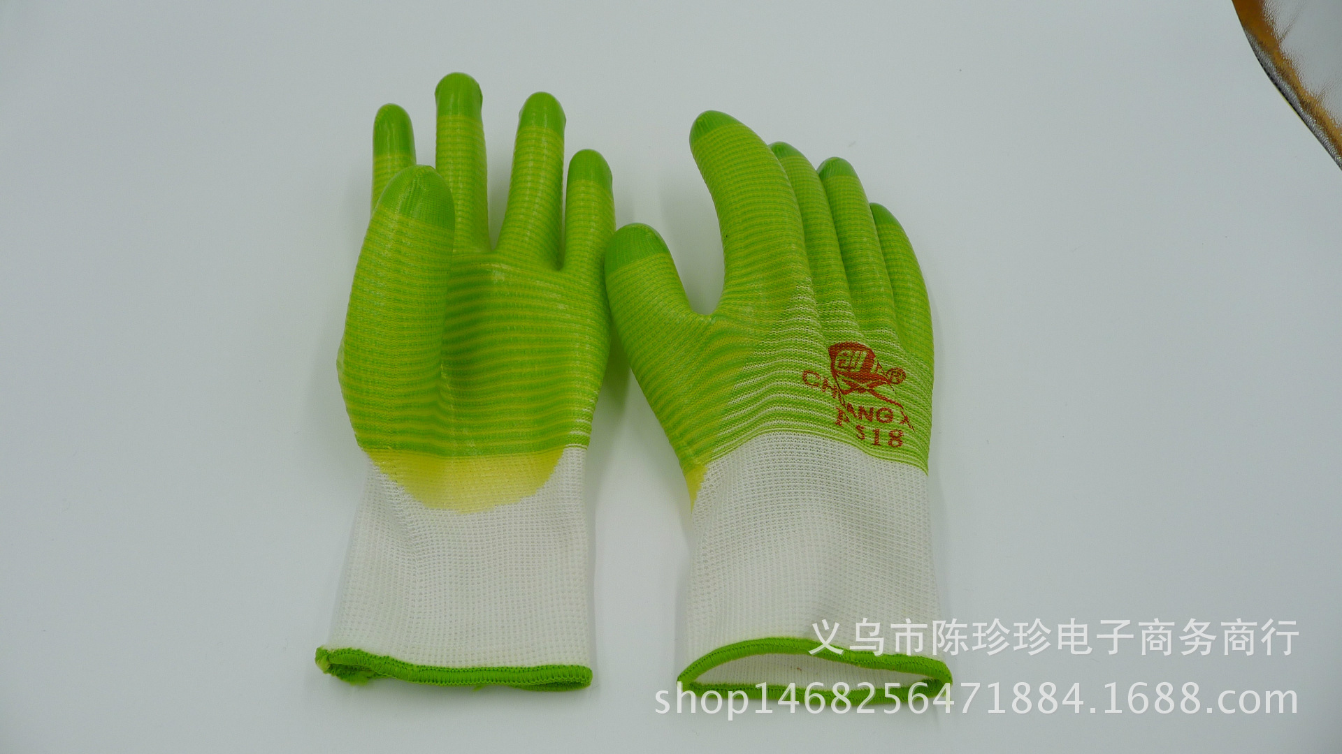 Factory direct selling hand protection green rib PVC gloves imported rubber gloves.