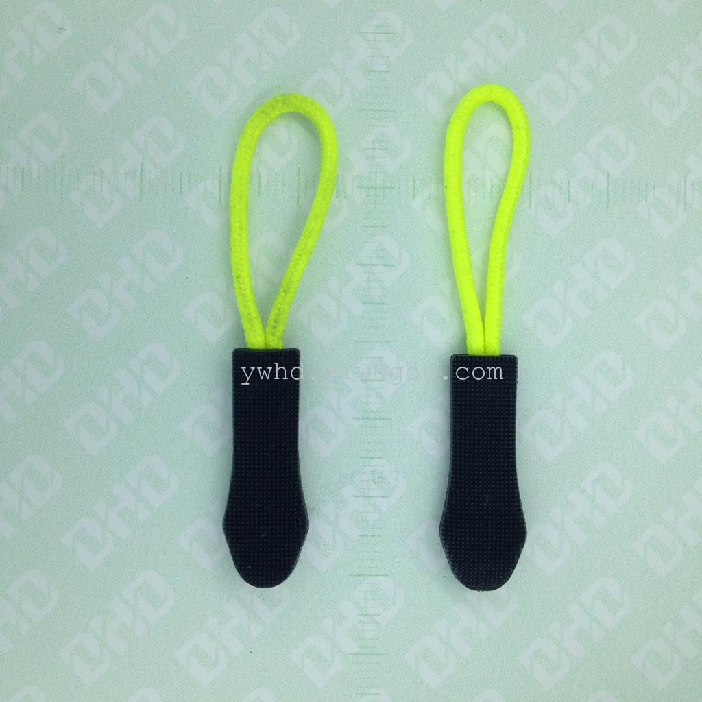 PVC injection molded green plastic bags outside the rope end of the zipper pull tab