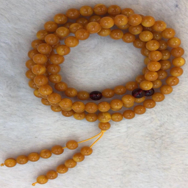 Hot style amber beeswax 8MM108 beads bracelet female chicken oil yellow second generation blood Po jin Po blue Po hand