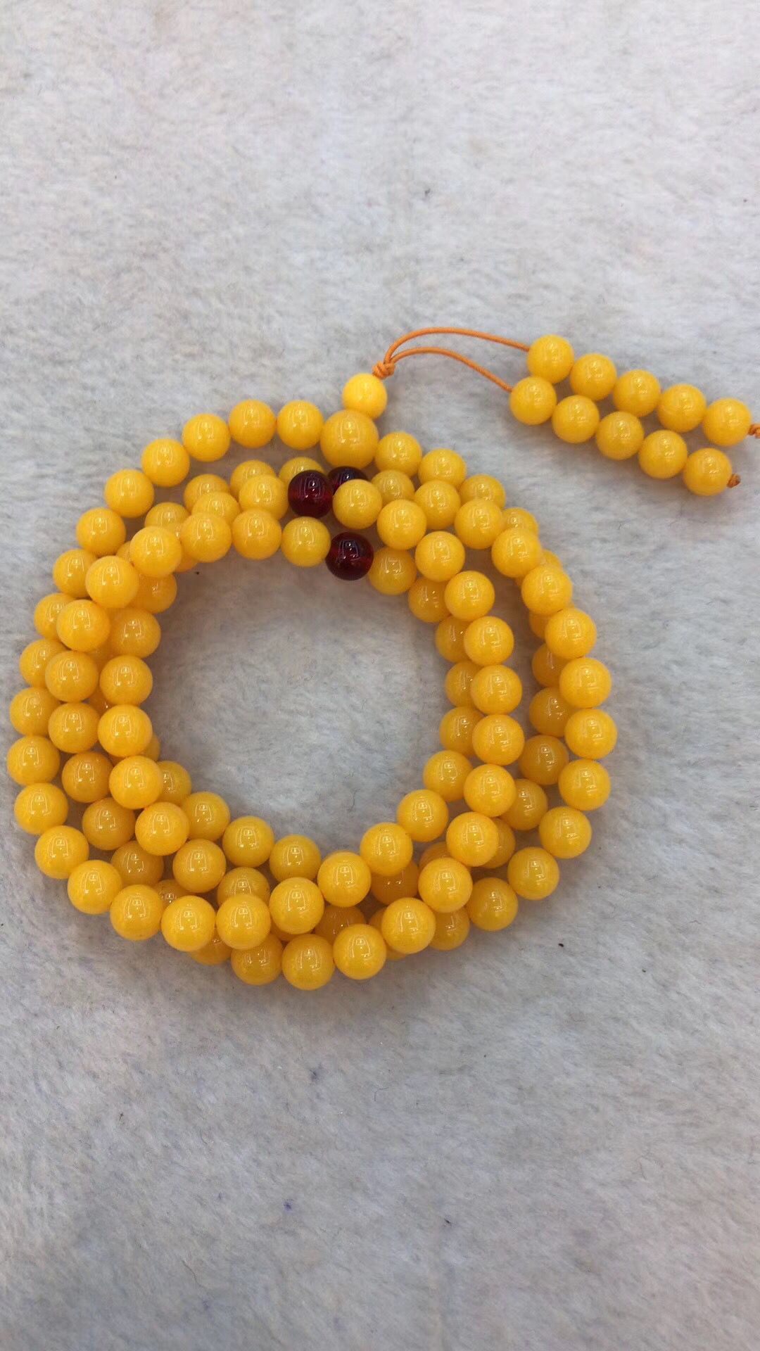 Hot style amber beeswax 8MM108 beads bracelet female chicken oil yellow second generation blood Po jin Po blue Po hand