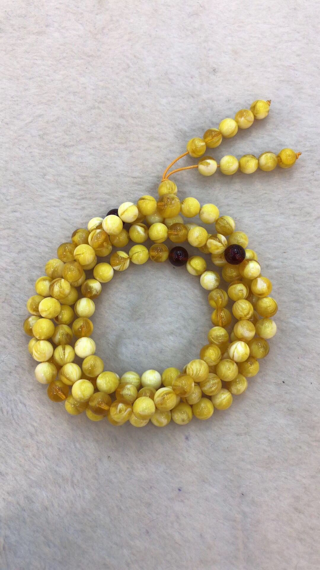 Hot style amber beeswax 8MM108 beads bracelet female chicken oil yellow second generation blood Po jin Po blue Po hand