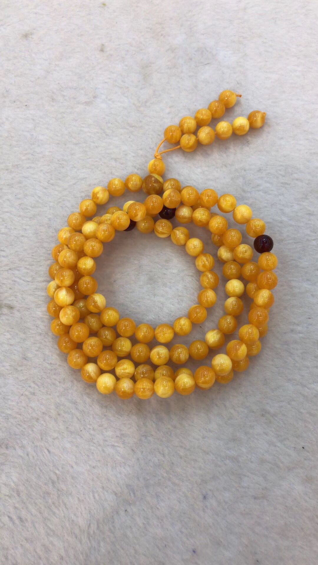 Hot style amber beeswax 8MM108 beads bracelet female chicken oil yellow second generation blood Po jin Po blue Po hand