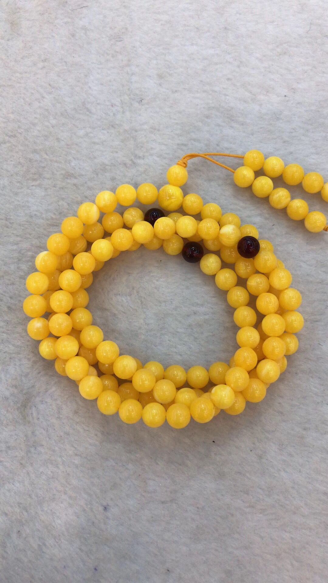 Hot style amber beeswax 8MM108 beads bracelet female chicken oil yellow second generation blood Po jin Po blue Po hand