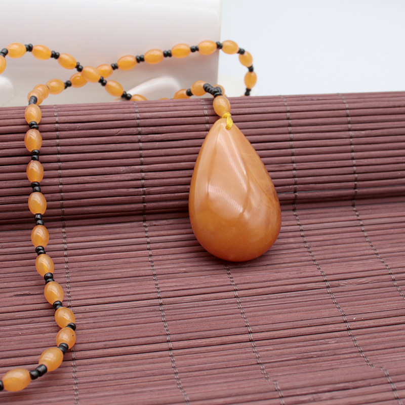 Old Beeswax Sweater Chain Men's and Women's Second Generation Yellow Chicken Grease Amber Long Necklace Ethnic Style Pendant Factory Wholesale Old Beeswax Sweater Chain Men's and Women's Second Generation Yellow Chicken Grease Amber Long Necklace Ethnic Style Pendant Factory Wholesale