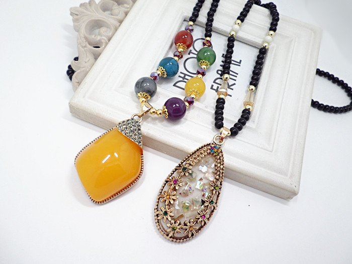 European and American National Style Original Imitation Beeswax Color Shell Long Sweater Chain Autumn Winter Retro Water Drop Necklace Necklace Wholesale European and American National Style Original Imitation Beeswax Color Shell Long Sweater Chain Autumn Winter Retro Water Drop Necklace Necklace Wholesale