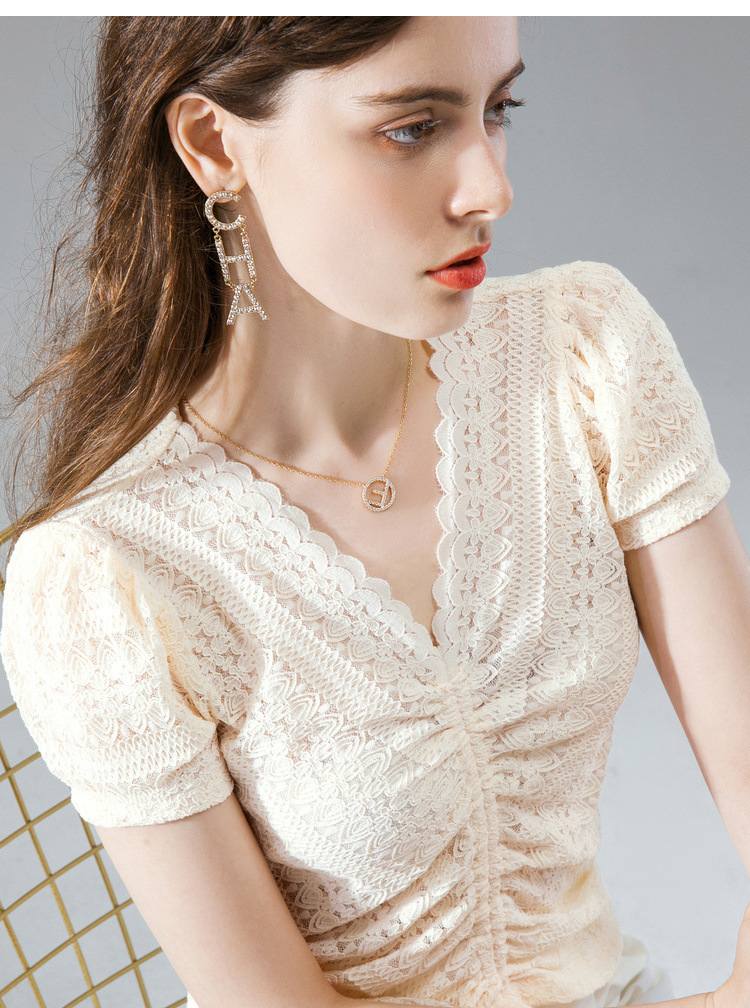 women with wavy edge and Vneck lace shirt for women with summer 2020 blouse with pleated drawstring and bubble sleeve