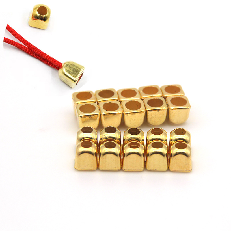 Factory direct electroplating gold plastic bell plastic rope buckle wholesale drawstring bag jewelry pendant accessories bell