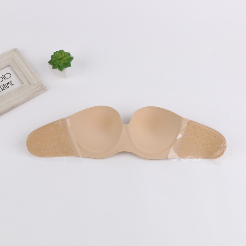 A piece of seamless silicone bra for A woman with A glossy bra side the bra together to pass reveal the back of the bra
