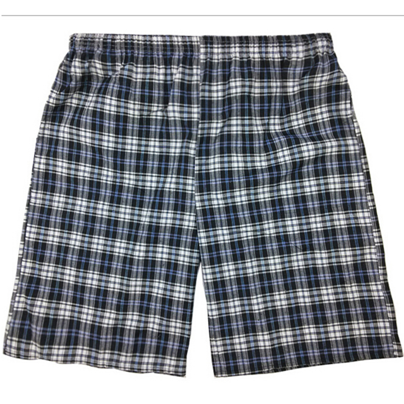 Summer new men &#039;s cotton and linen loose to increase the code home leisure lattice beach pants