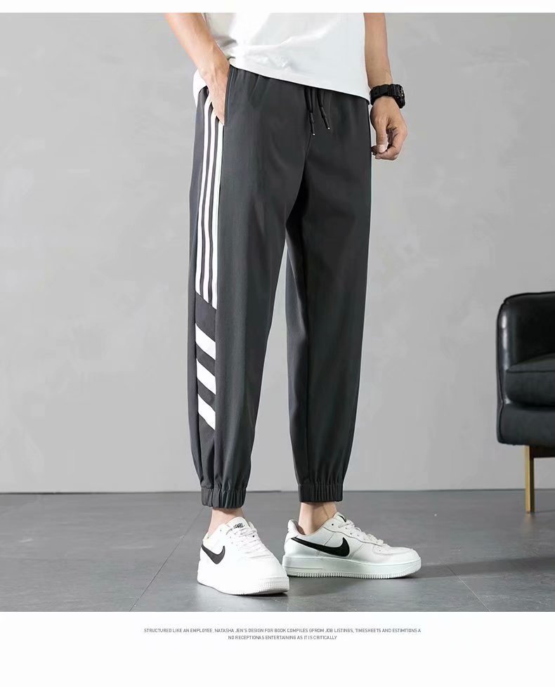 Sports Pants Men's Autumn Loose Cropped Casual Pants Trend Stripes Campus Loose Tappered Internet Celebrity Men's Ninth Pants Sports Pants Men's Autumn Loose Cropped Casual Pants Trend Stripes Campus Loose Tappered Internet Celebrity Men's Ninth Pants