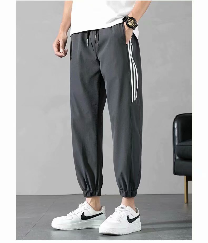 Sports Pants Men's Autumn Loose Cropped Casual Pants Trend Stripes Campus Loose Tappered Internet Celebrity Men's Ninth Pants Sports Pants Men's Autumn Loose Cropped Casual Pants Trend Stripes Campus Loose Tappered Internet Celebrity Men's Ninth Pants
