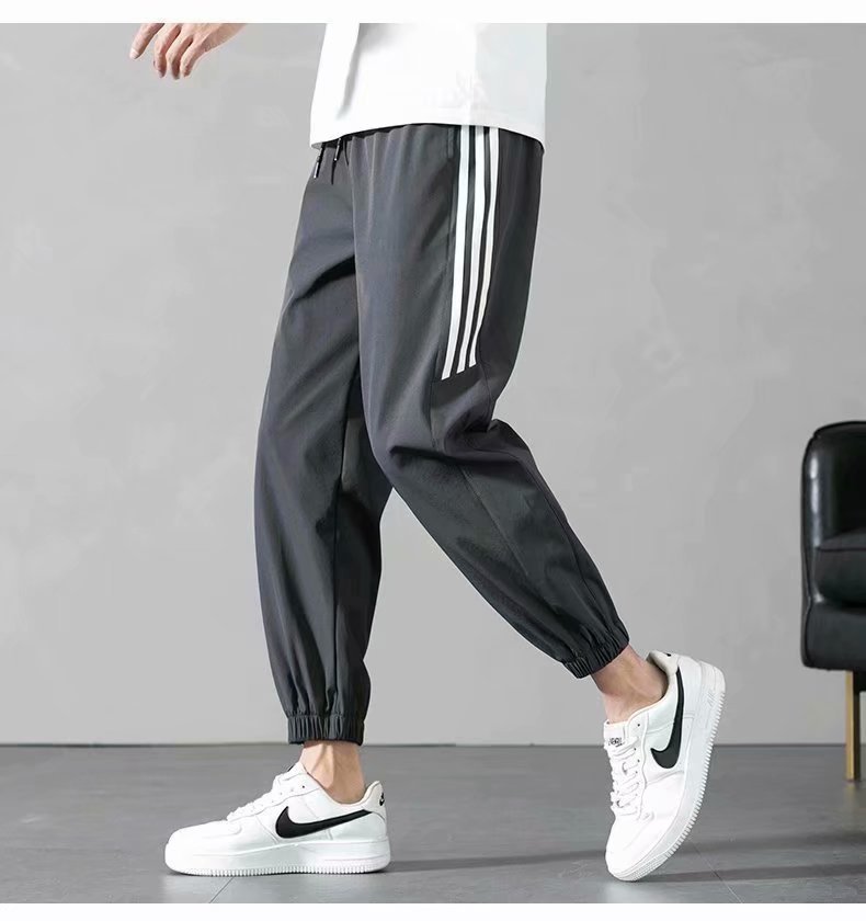 Sports Pants Men's Autumn Loose Cropped Casual Pants Trend Stripes Campus Loose Tappered Internet Celebrity Men's Ninth Pants Sports Pants Men's Autumn Loose Cropped Casual Pants Trend Stripes Campus Loose Tappered Internet Celebrity Men's Ninth Pants