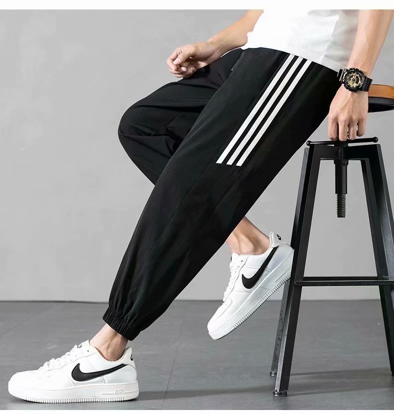 Sports Pants Men's Autumn Loose Cropped Casual Pants Trend Stripes Campus Loose Tappered Internet Celebrity Men's Ninth Pants Sports Pants Men's Autumn Loose Cropped Casual Pants Trend Stripes Campus Loose Tappered Internet Celebrity Men's Ninth Pants