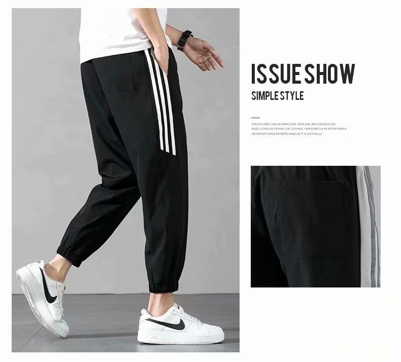 Sports Pants Men's Autumn Loose Cropped Casual Pants Trend Stripes Campus Loose Tappered Internet Celebrity Men's Ninth Pants Sports Pants Men's Autumn Loose Cropped Casual Pants Trend Stripes Campus Loose Tappered Internet Celebrity Men's Ninth Pants
