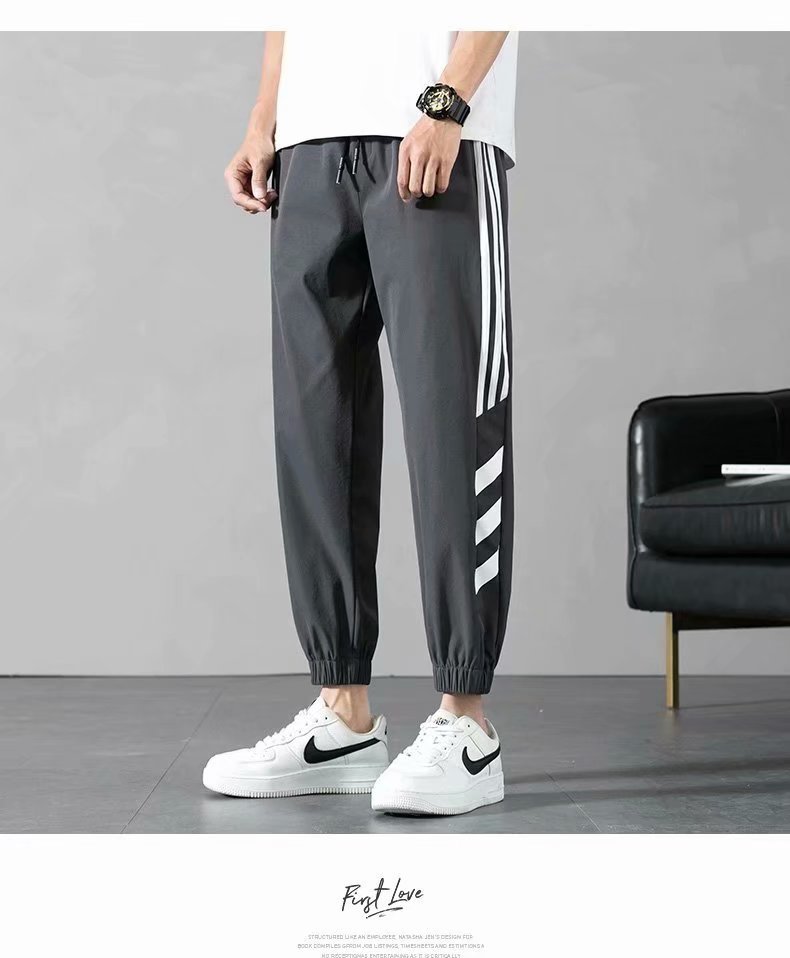 Sports Pants Men's Autumn Loose Cropped Casual Pants Trend Stripes Campus Loose Tappered Internet Celebrity Men's Ninth Pants Sports Pants Men's Autumn Loose Cropped Casual Pants Trend Stripes Campus Loose Tappered Internet Celebrity Men's Ninth Pants
