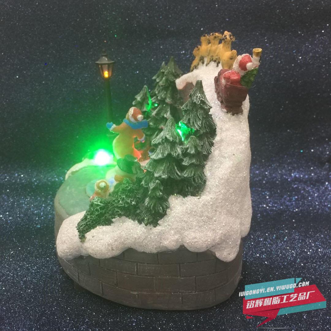 Manufacturer sells new electric Santa Claus Christmas tree for Christmas inside the crystal ball with music spinning
