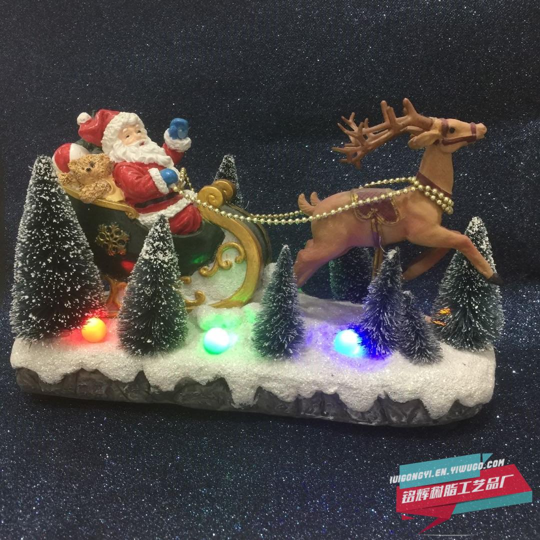 Manufacturer sells new electric Santa Claus Christmas tree for Christmas inside the crystal ball with lights spinning