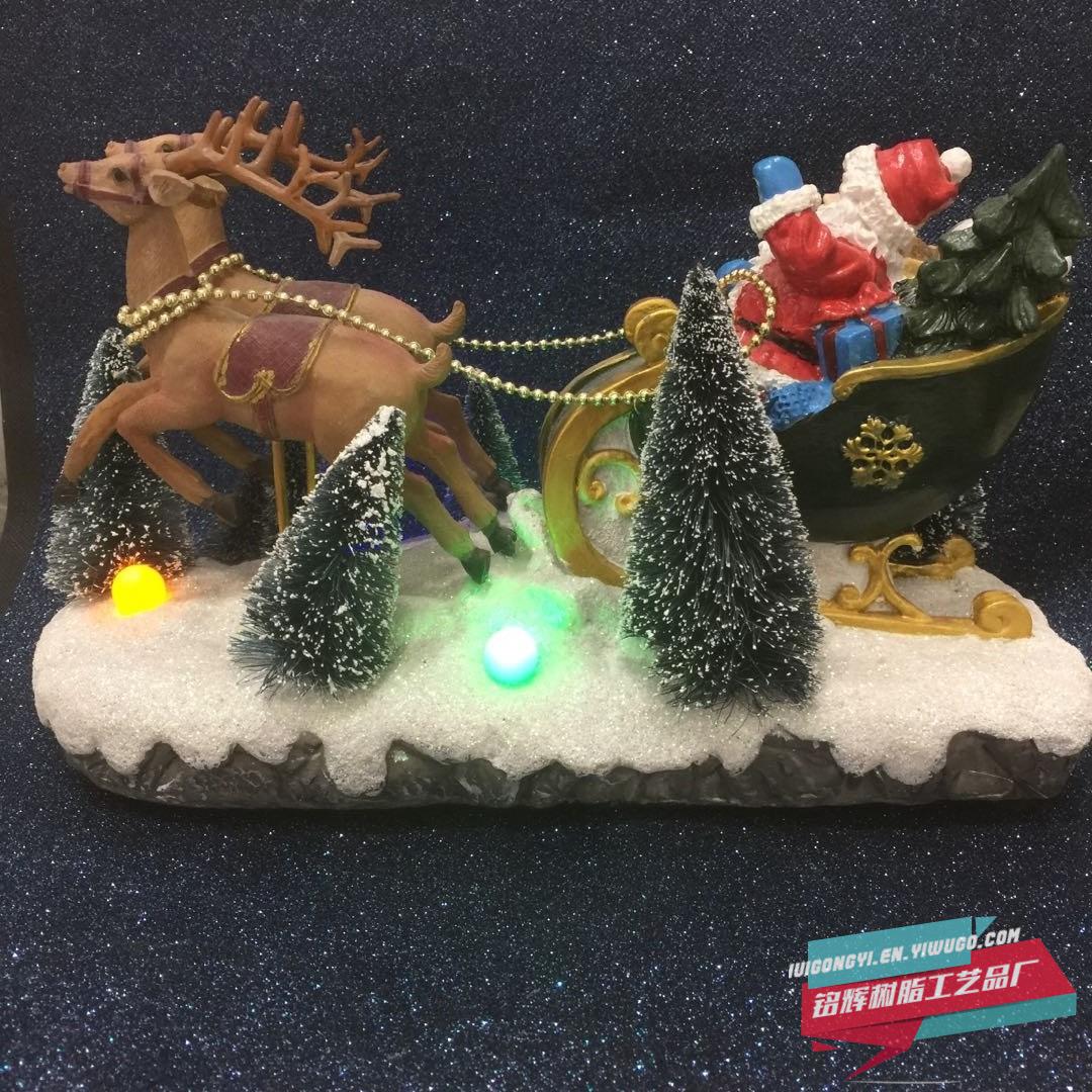 Manufacturer sells new electric Santa Claus Christmas tree for Christmas inside the crystal ball with lights spinning