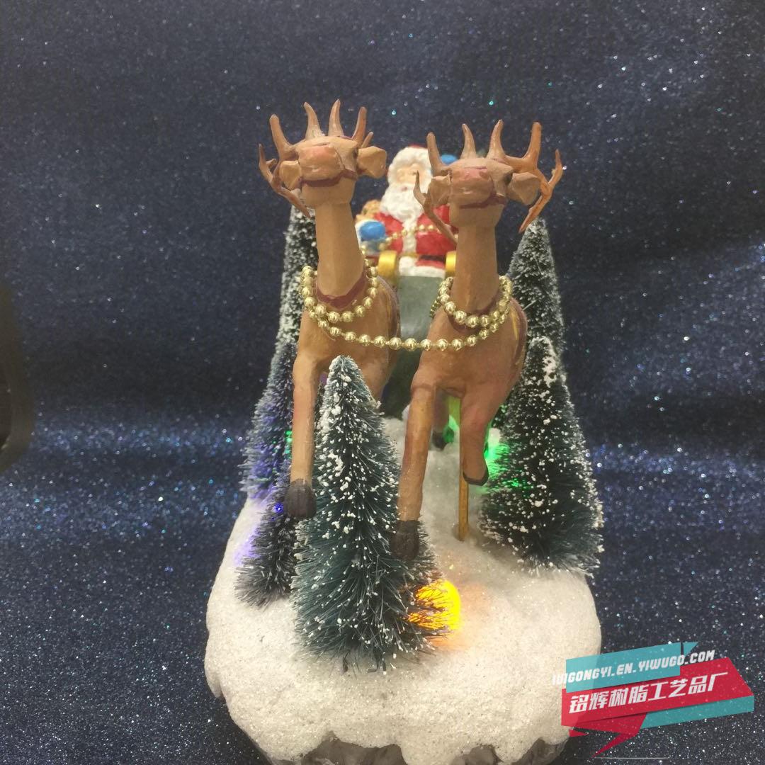 Manufacturer sells new electric Santa Claus Christmas tree for Christmas inside the crystal ball with lights spinning