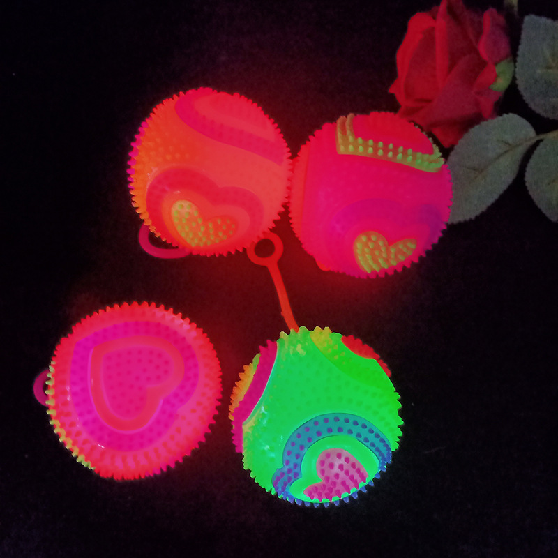 Glowing massage ball 7.5 cm bouncy ball flashing football with string and whistle piercing ball Glowing children 's toy