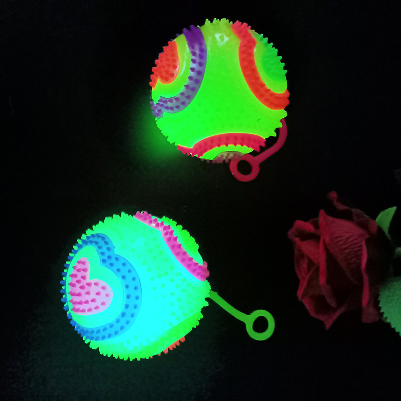 Glowing massage ball 7.5 cm bouncy ball flashing football with string and whistle piercing ball Glowing children 's toy