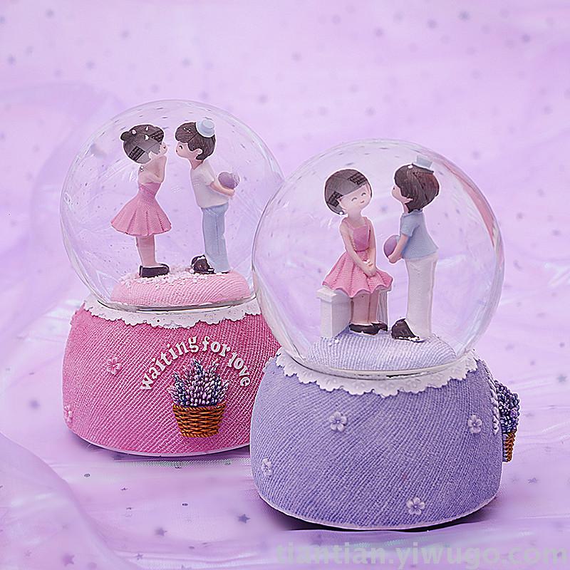 A troupe set with love lovers performed by crystal ball music box dream luminous snowflake music box