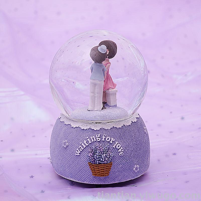 A troupe set with love lovers performed by crystal ball music box dream luminous snowflake music box