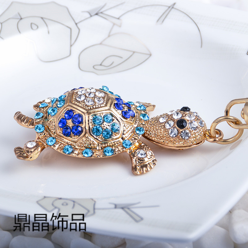 The other diamond metal Meng Meng creative animation and gift car key buckle factory direct sales