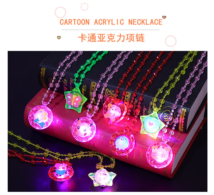 The ground stall sells novelty toys to shine necklace led flash yakeli bead cartoon pendant child gift