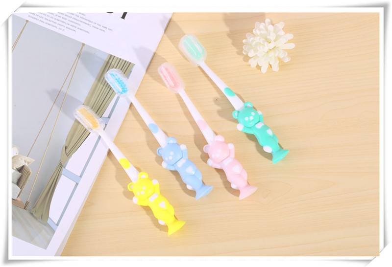 Japanese lovely cartoon 4 small rabbit bear soft bristle children 's toothbrush with suction cup baby toothbrush Japanese lovely cartoon 4 small rabbit bear soft bristle children 's toothbrush with suction cup baby toothbrush