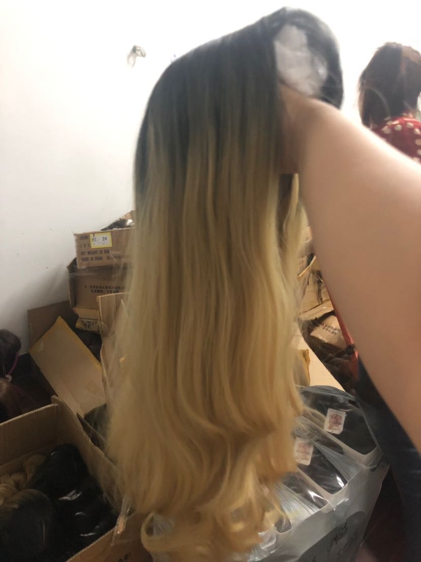 A blonde wig with natural curls