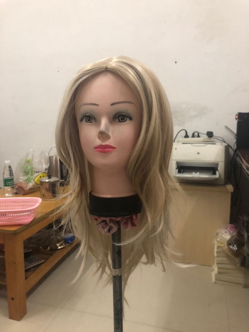 A blonde wig with natural curls