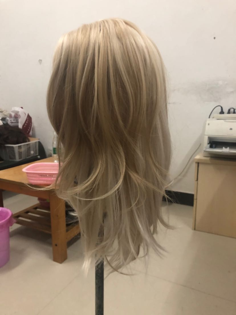 A blonde wig with natural curls