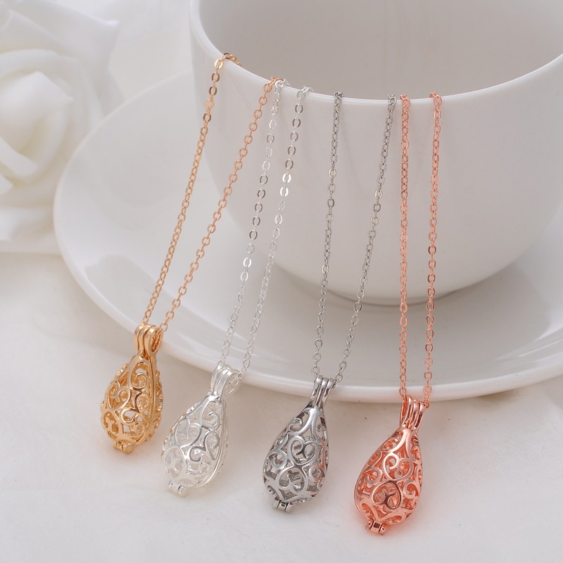 DIY ladies pregnant women qinyin ball refined oil bottle hollowed - out drip magic box aroma phase box sweater necklace pendant lock DIY ladies pregnant women qinyin ball refined oil bottle hollowed - out drip magic box aroma phase box sweater necklace pendant lock