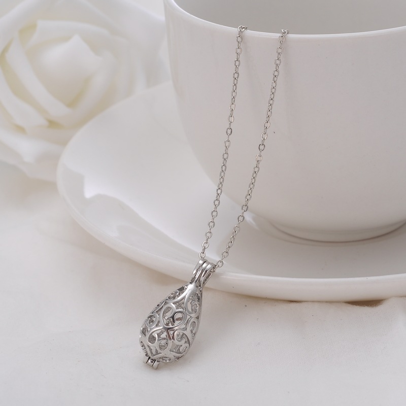 DIY ladies pregnant women qinyin ball refined oil bottle hollowed - out drip magic box aroma phase box sweater necklace pendant lock DIY ladies pregnant women qinyin ball refined oil bottle hollowed - out drip magic box aroma phase box sweater necklace pendant lock