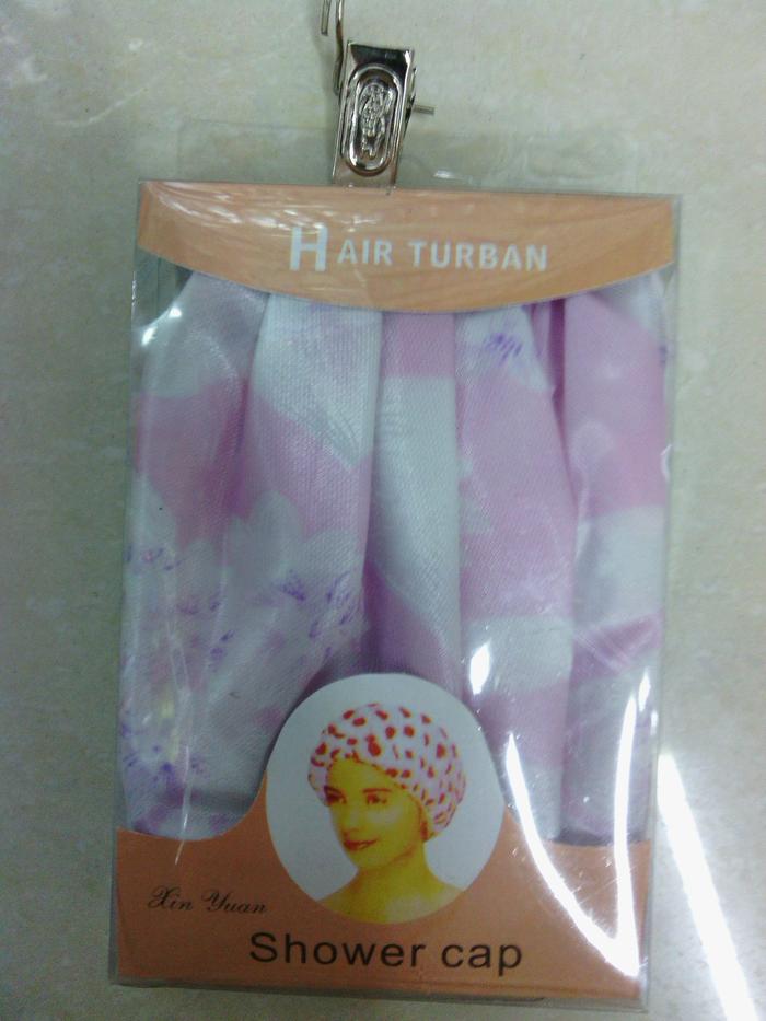 Polyester fabric shower cap for a single package Polyester fabric shower cap for a single package