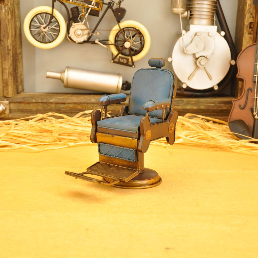 Vintage iron art for the cash register counter props creative tin American barbershop chairs small model crafts. Vintage iron art for the cash register counter props creative tin American barbershop chairs small model crafts.