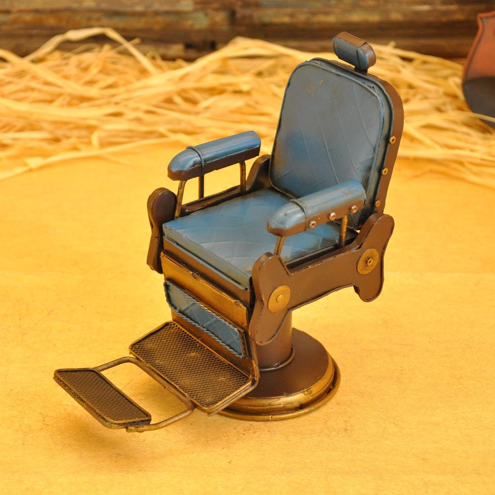 Vintage iron art for the cash register counter props creative tin American barbershop chairs small model crafts. Vintage iron art for the cash register counter props creative tin American barbershop chairs small model crafts.