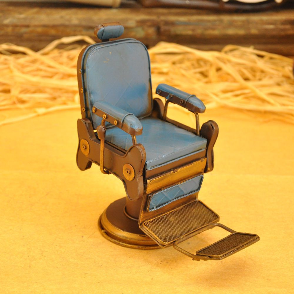 Vintage iron art for the cash register counter props creative tin American barbershop chairs small model crafts. Vintage iron art for the cash register counter props creative tin American barbershop chairs small model crafts.