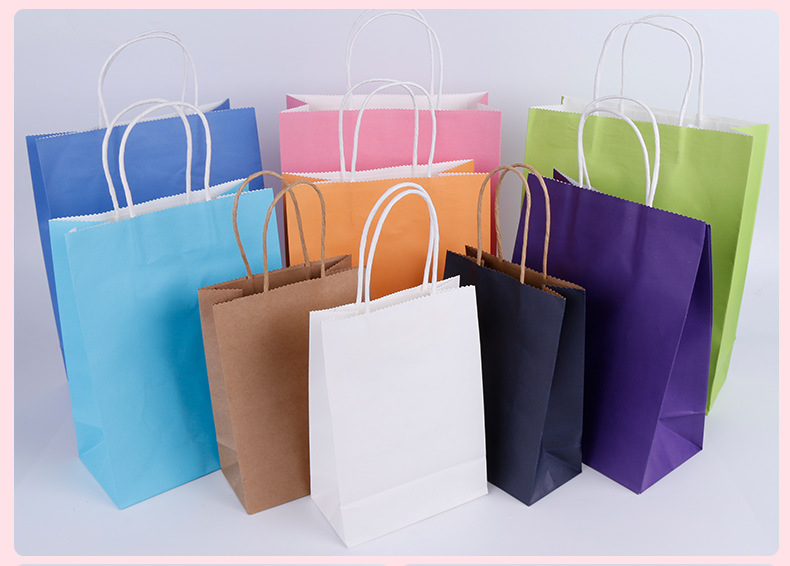 Spot solid color kraft paper clothing shopping handbag cosmetic packaging bag Kraft handbag wholesale Spot solid color kraft paper clothing shopping handbag cosmetic packaging bag Kraft handbag wholesale