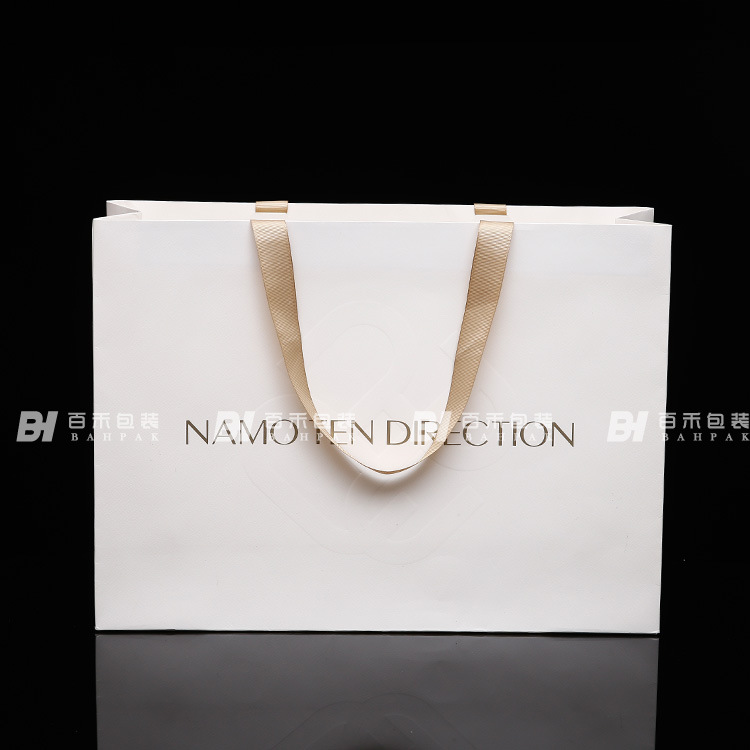 Paper Bag Manufacturer White Card Clothing Rivet Hand-Carrying Paper Bag Clothes Packaging Shopping Gift Hand Twist Paper Bag plus Logo Paper Bag Manufacturer White Card Clothing Rivet Hand-Carrying Paper Bag Clothes Packaging Shopping Gift Hand Twist Paper Bag plus Logo