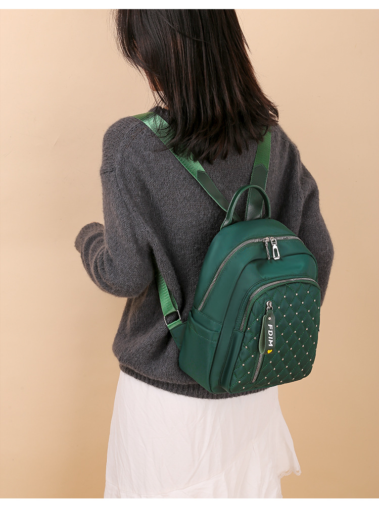 2020 New Women's Bag Oxford Cloth Backpack Waterproof Nylon Schoolbag Women's Korean Style Rivet Casual Backpack Wholesale 2020 New Women's Bag Oxford Cloth Backpack Waterproof Nylon Schoolbag Women's Korean Style Rivet Casual Backpack Wholesale