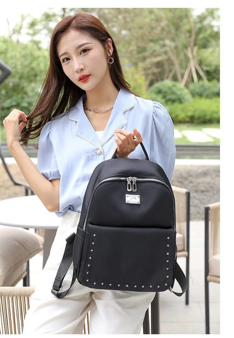 Foreign Trade Wholesale Spring and Autumn New Trendy Japanese and Korean Style Casual Temperament Sports Rivet XINGX Nylon Backpack Women's Bag Foreign Trade Wholesale Spring and Autumn New Trendy Japanese and Korean Style Casual Temperament Sports Rivet XINGX Nylon Backpack Women's Bag