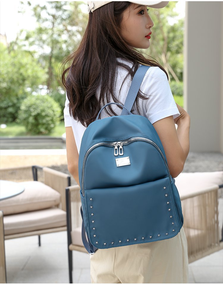 Foreign Trade Wholesale Spring and Autumn New Trendy Japanese and Korean Style Casual Temperament Sports Rivet XINGX Nylon Backpack Women's Bag Foreign Trade Wholesale Spring and Autumn New Trendy Japanese and Korean Style Casual Temperament Sports Rivet XINGX Nylon Backpack Women's Bag