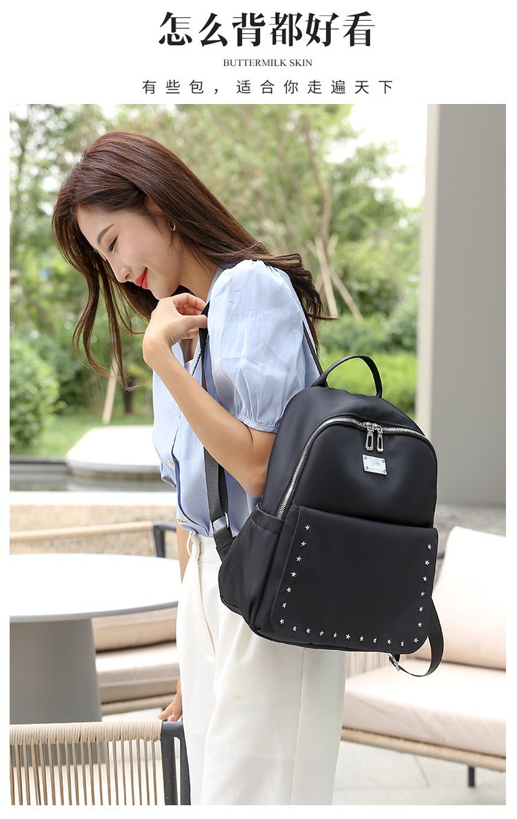 Foreign Trade Wholesale Spring and Autumn New Trendy Japanese and Korean Style Casual Temperament Sports Rivet XINGX Nylon Backpack Women's Bag Foreign Trade Wholesale Spring and Autumn New Trendy Japanese and Korean Style Casual Temperament Sports Rivet XINGX Nylon Backpack Women's Bag