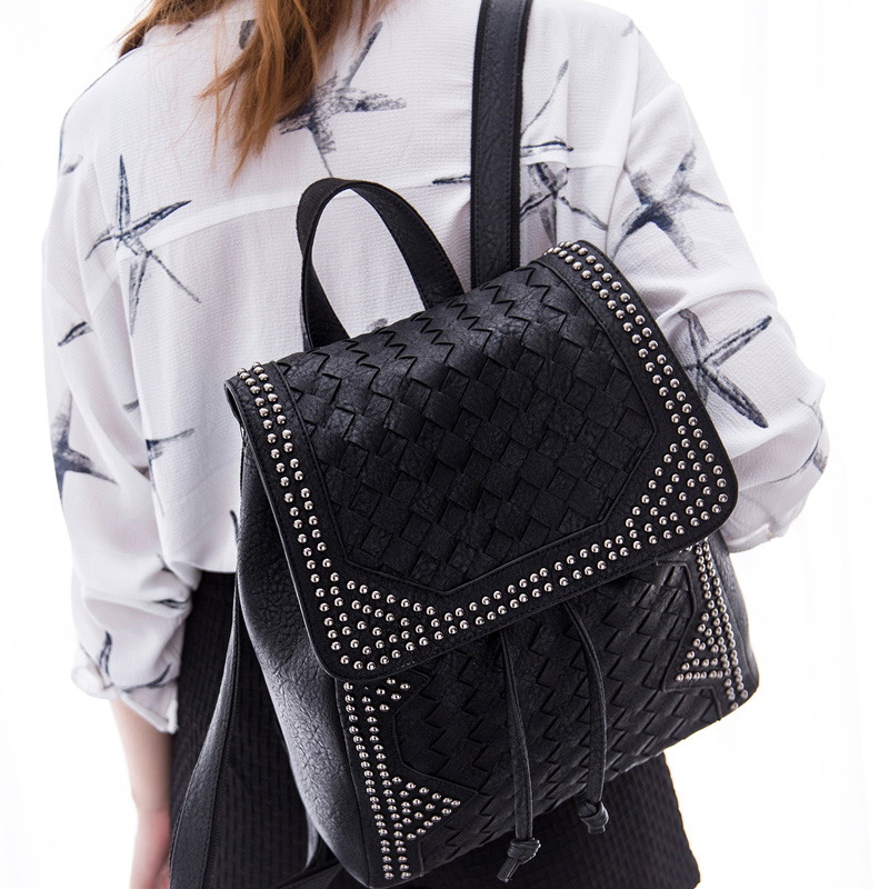 2015 new fashion woven backpack Korean star rivet bag